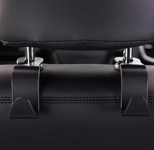 Car headrest hooks installed in different cars with bags hanging from the seats